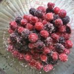 frozen sugared cherries sitting in a bowl