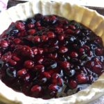 Double-Crusted Sweet Southern Cherry Pie with raw dough and filled with dark cherry pie filling