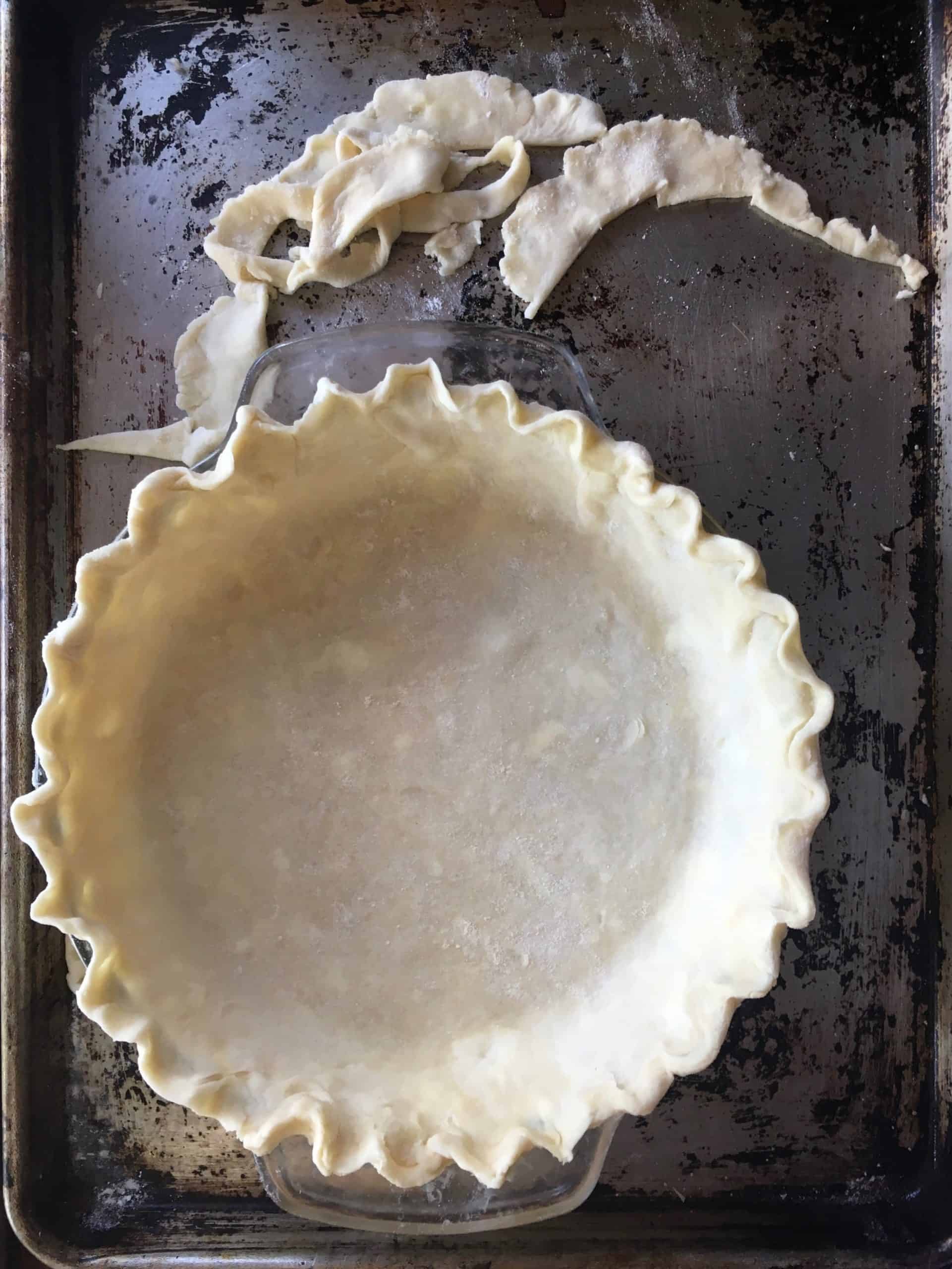 butter and lard pie crust in pie plate ready to be filled
