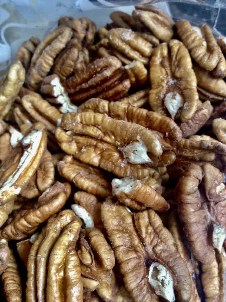 closeup of large pecans shelled and in halves