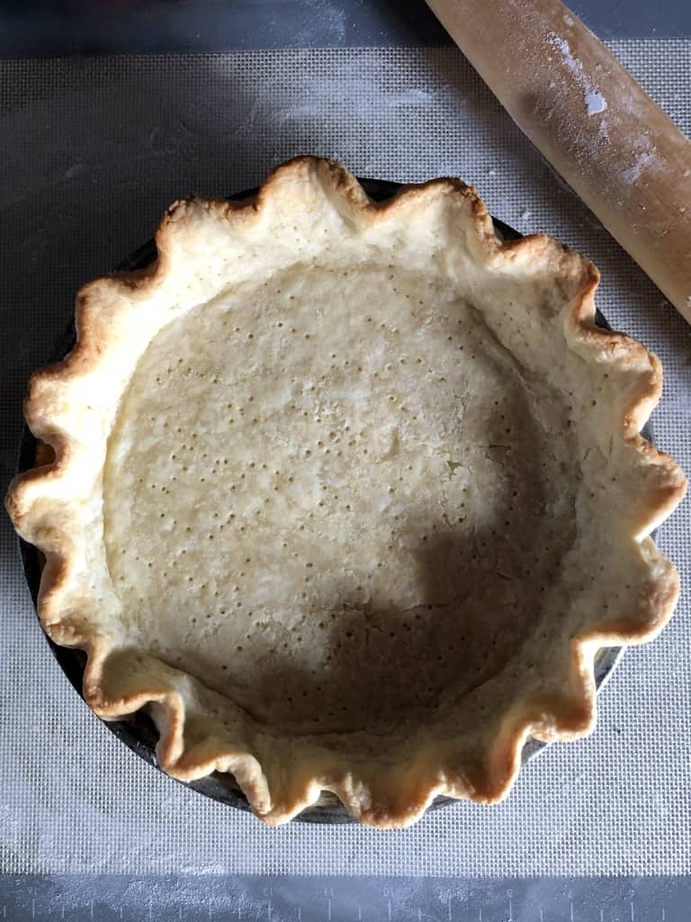 a blind baked single crust pie in a pie plate
