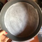 parchment circle added to buttered springform pan
