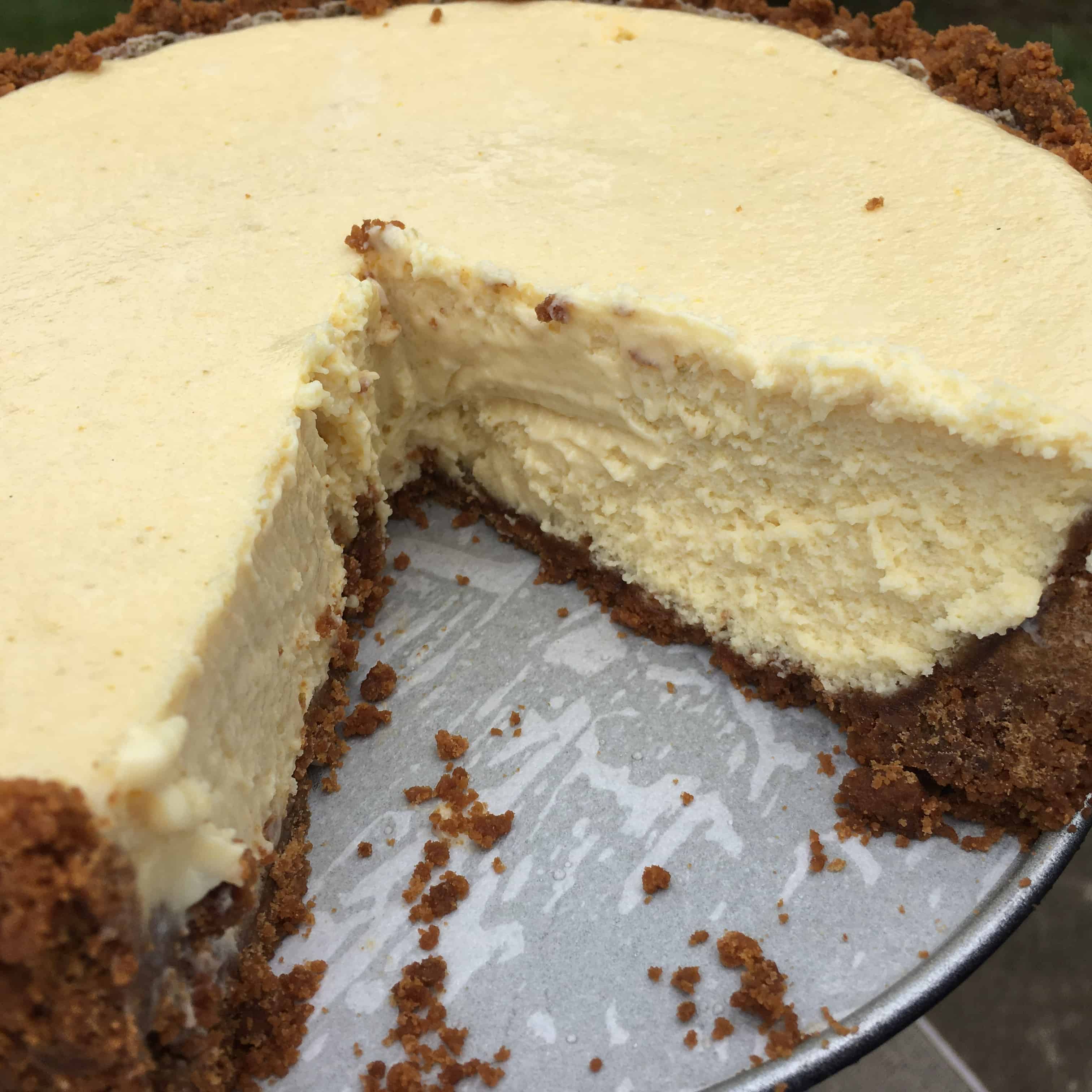 closeup of key lime pie with a slice cut out