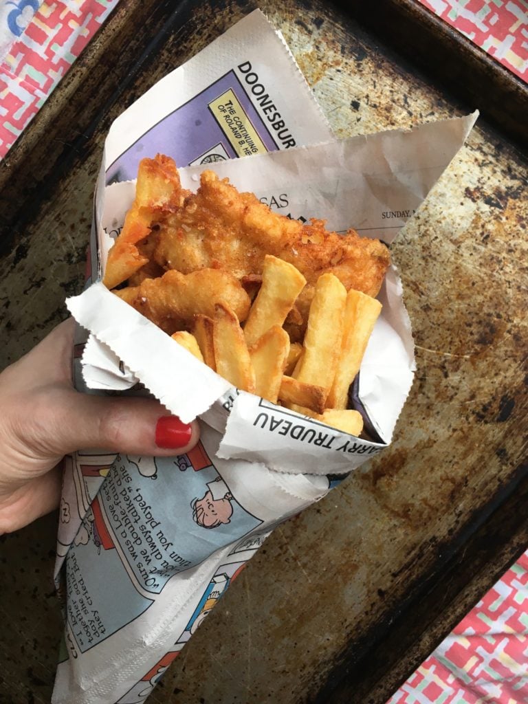 Fish and chips wrapped in newspaper comic strip paper.