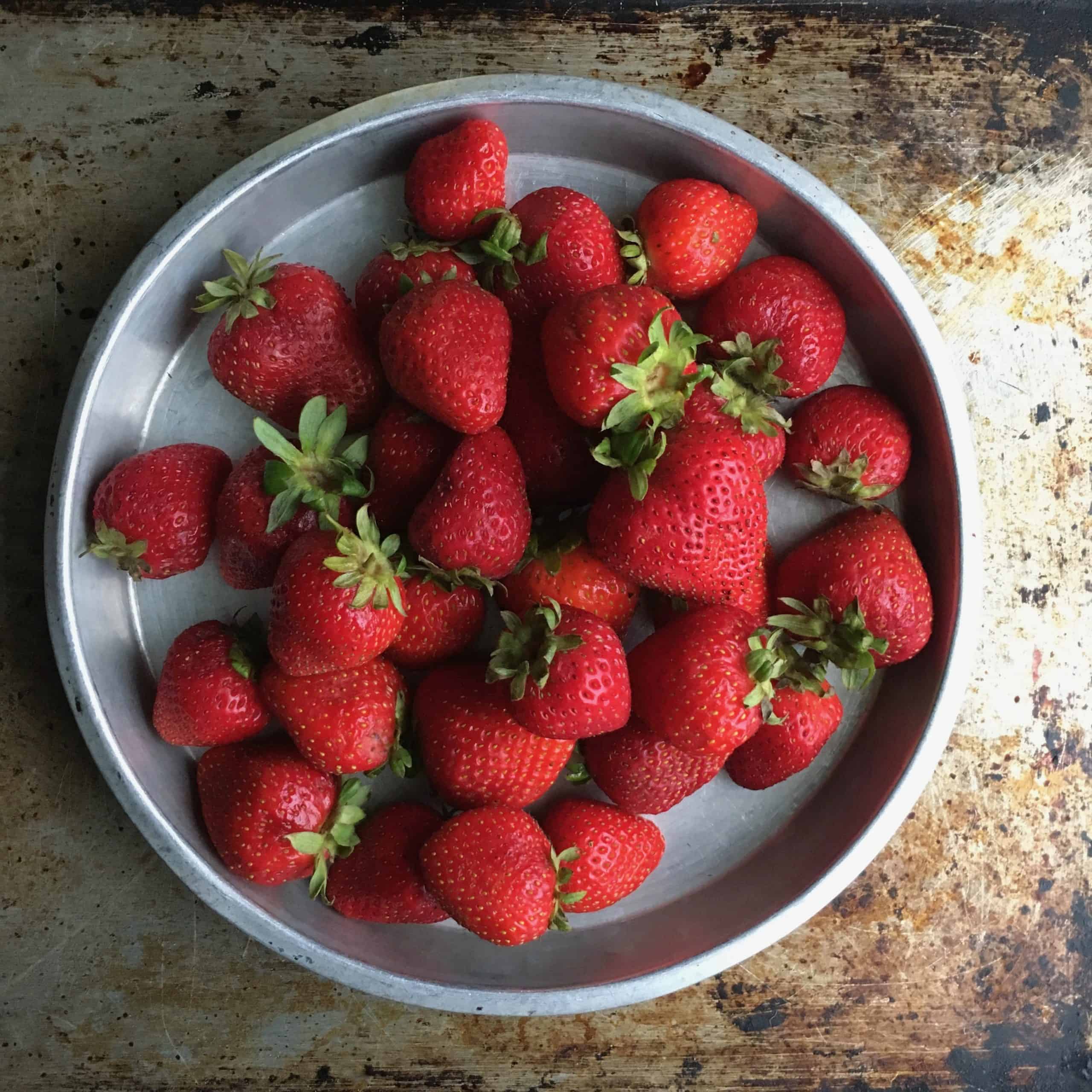 fresh strawberries in 1 inch aluminum round cake pan