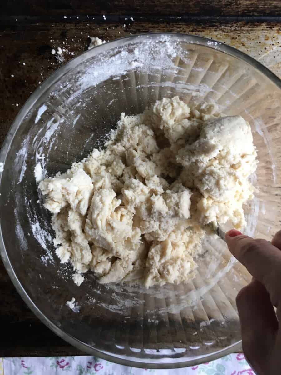blending the buttermilk to the flower mixture with a fork