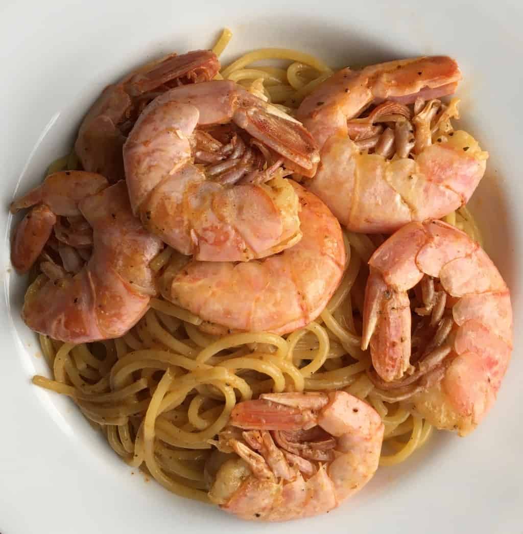 bowl of Cajun. Royal Red Pasta with lots of shrimp in the shells on top