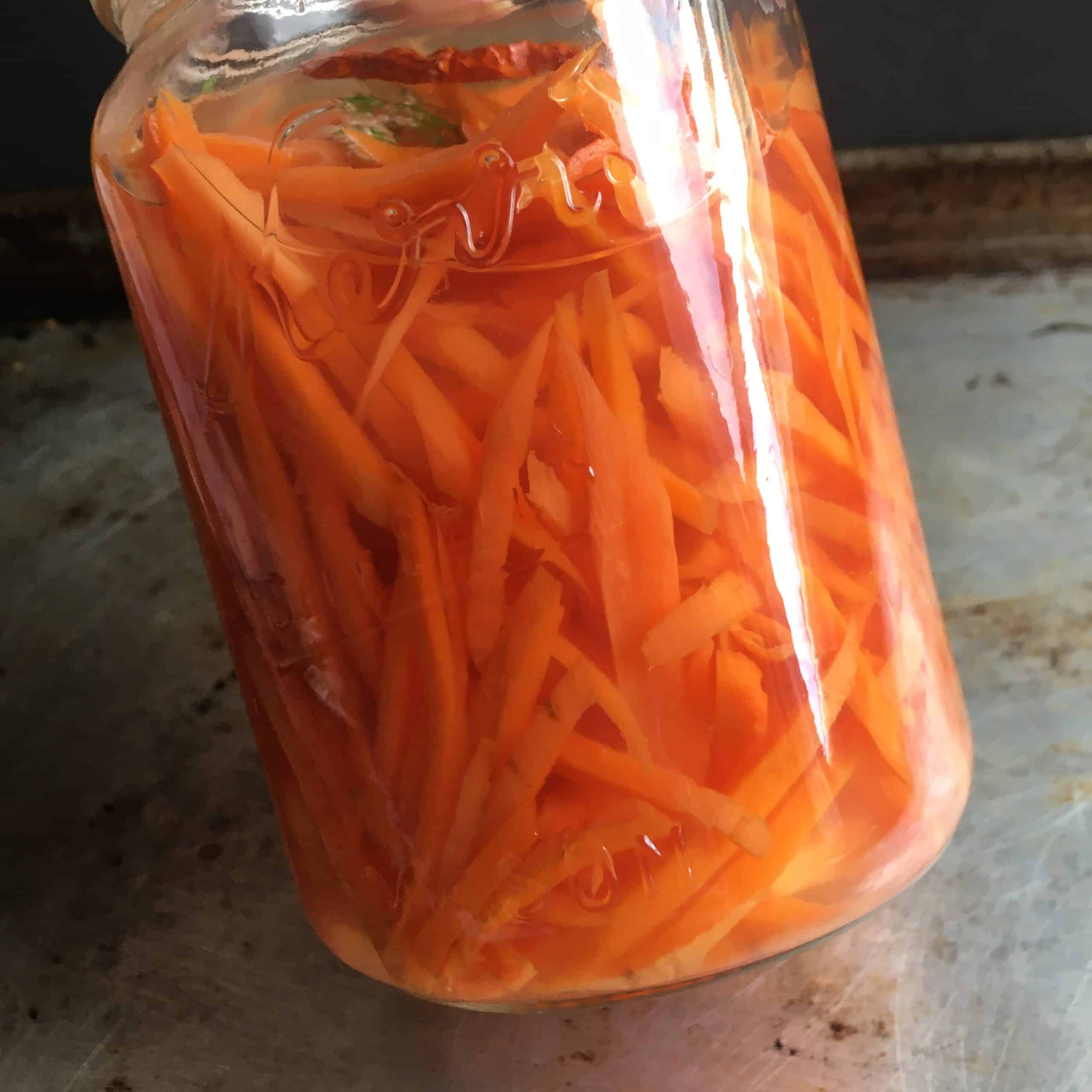 a jar of spicy Sichuan pickled carrots