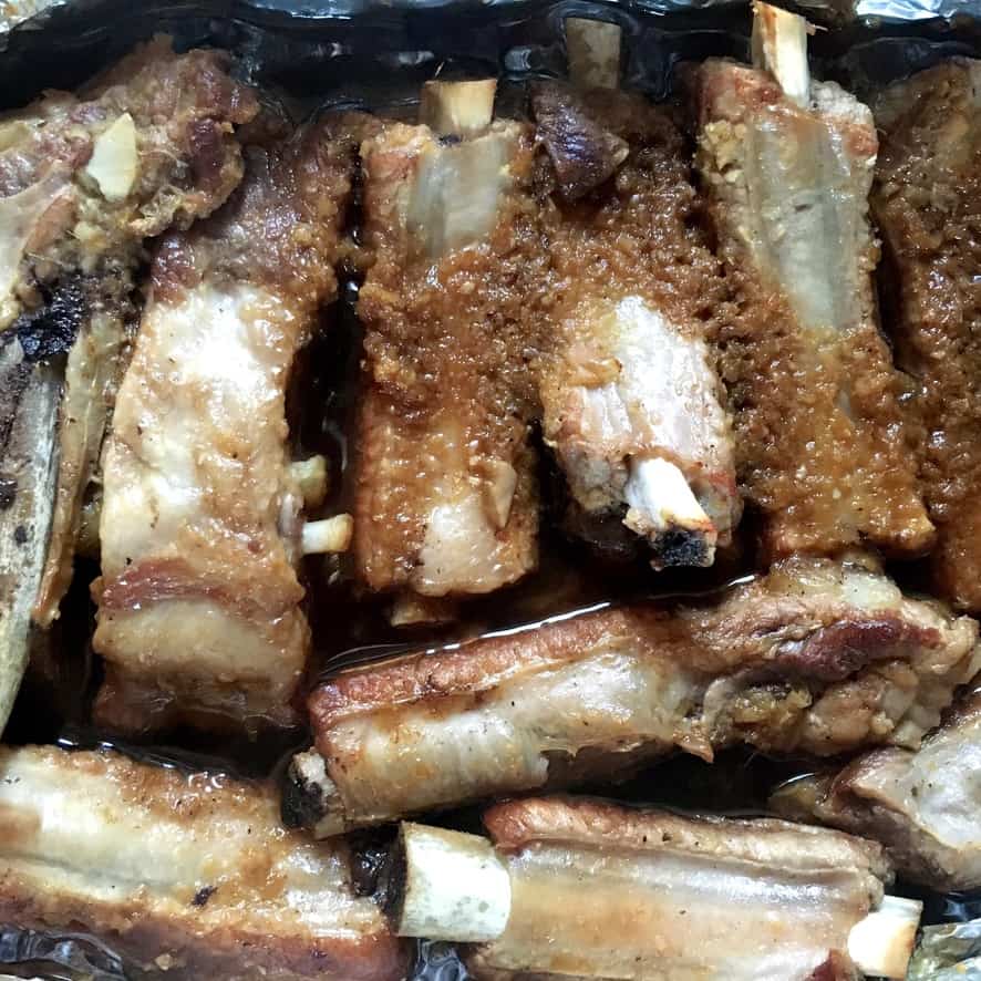fork tender pork ribs after removing them from the oven