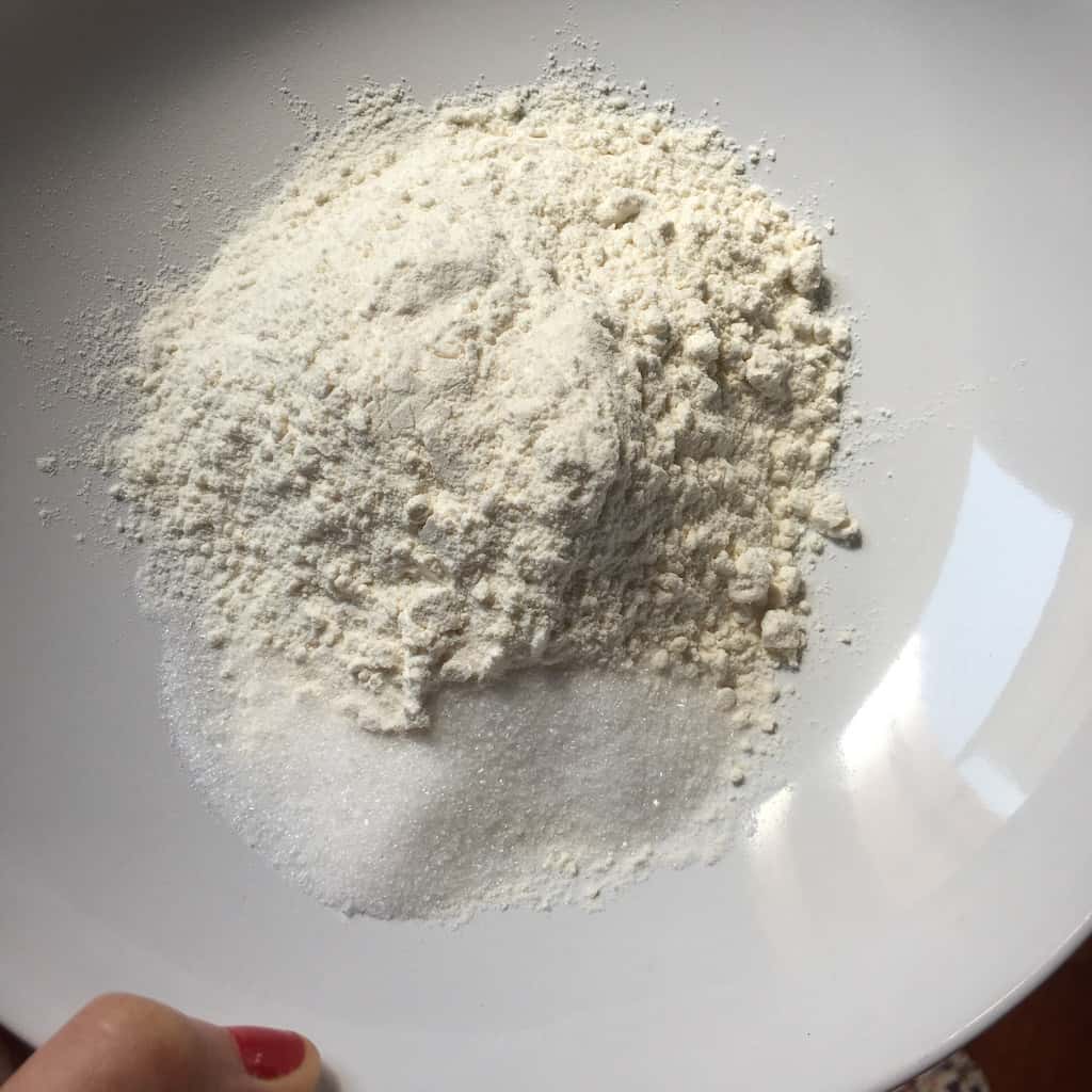 Flour and sugar in a bowl.