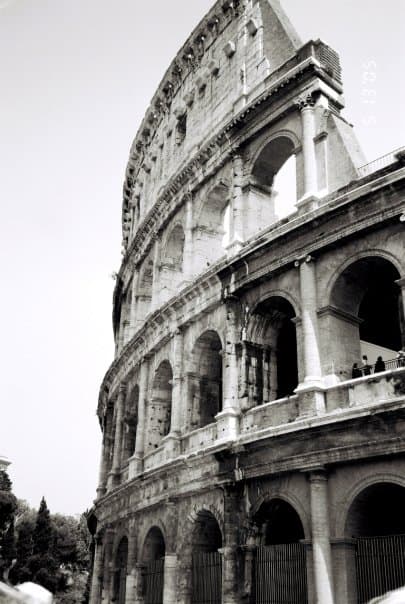 a black and white view of the Roman Colosseum