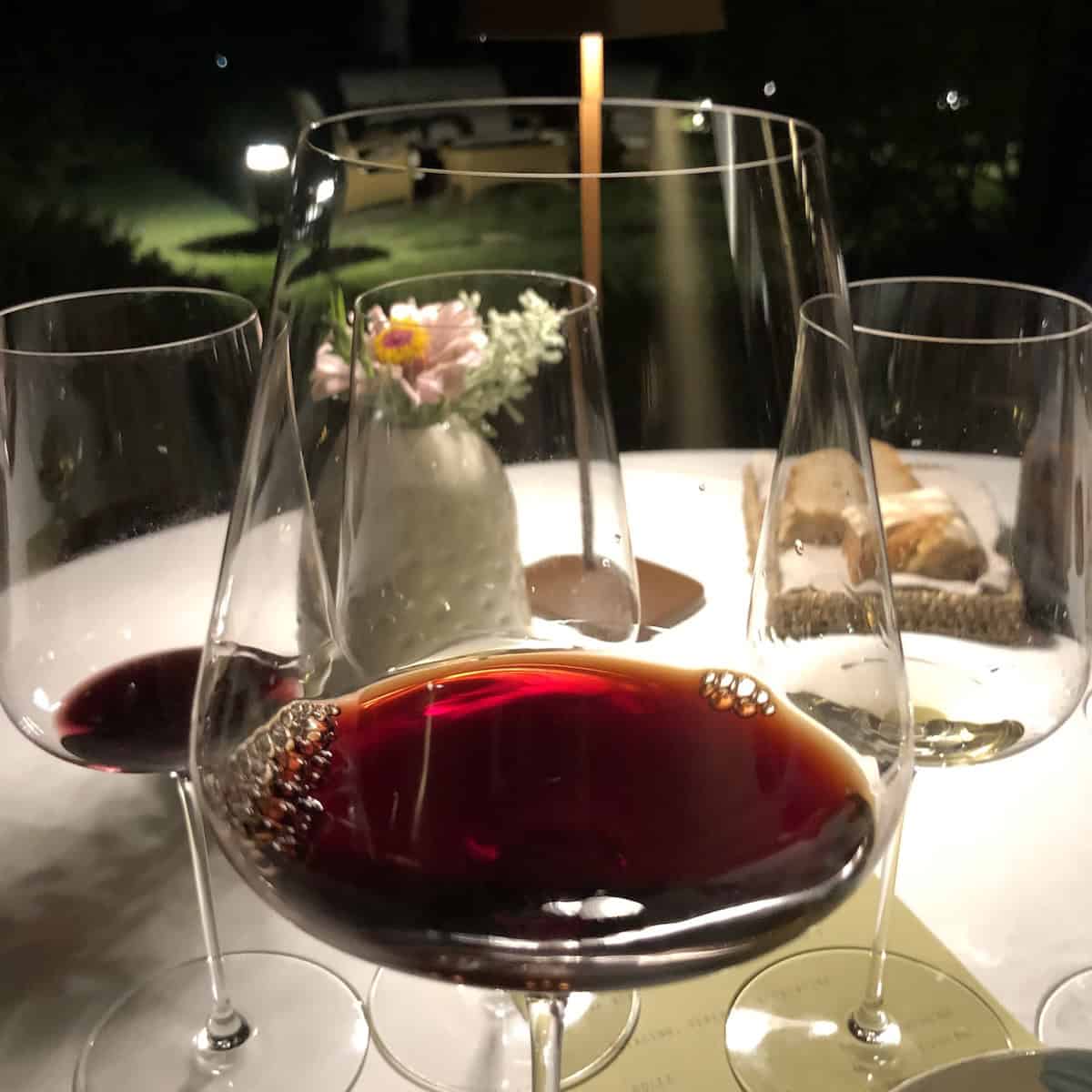 Glass of 2001 vintage Emidio Pepe Montepulciano d'Abruzzo red wine at the estate winery in Abruzzo Italy, pairs with amatriciana.