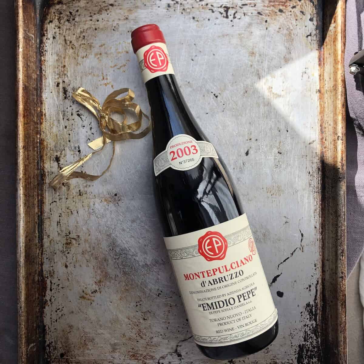 Bottle of Emidio Pepe Montepulciano d'Abruzzo red wine we bought when we toured the vineyards and estate and had the wine tasting dinner showing the perfect Italian wine pairing for authentic amatriciana pasta.

