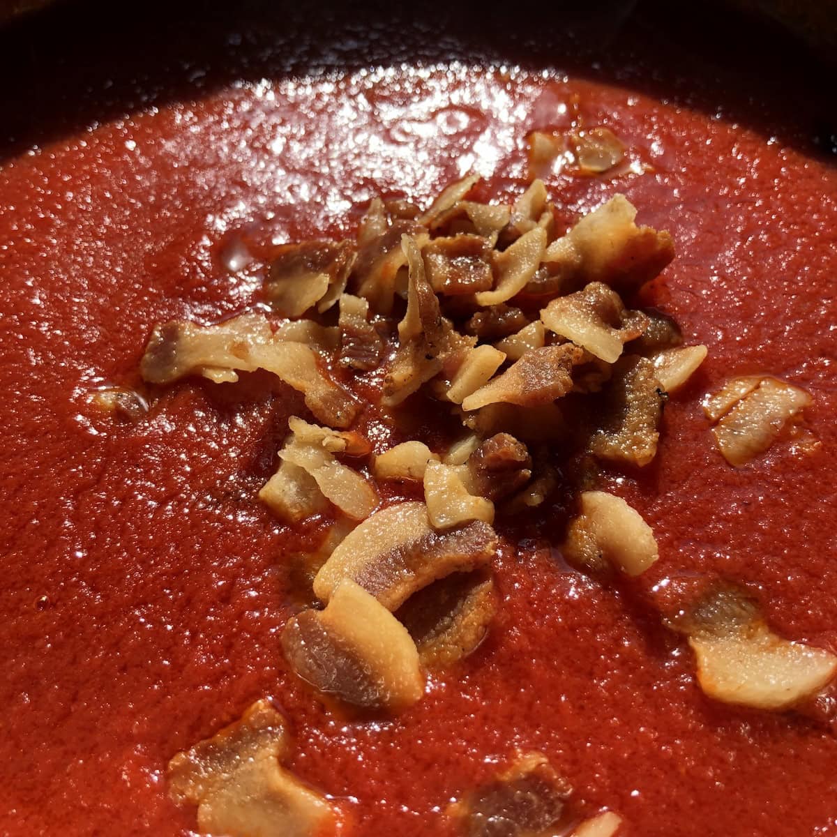 Guanciale added back to the amatriciana sauce.

