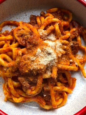 Homemade bucatini all'amatriciana made from scratch with fresh homemade bucatini pasta for a truly authentic pasta amatriciana recipe.