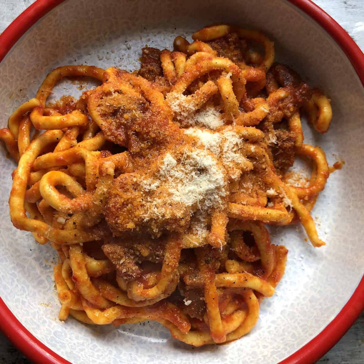 Homemade bucatini all'amatriciana made from scratch with fresh homemade bucatini pasta for a truly authentic pasta amatriciana recipe.