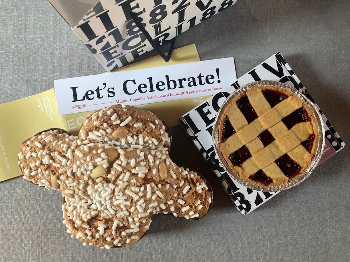 Our Apricot and salted caramel easter dover bread (la colomba from Olivieri 1882 out of the box sitting next to their raspberry crostata we also ordered.