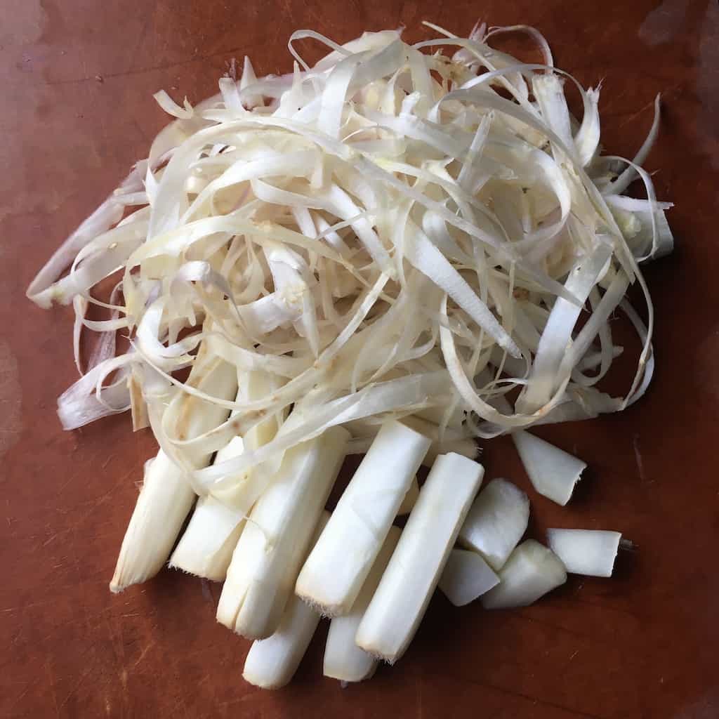 a pile of asparagus skin peels and tough ends