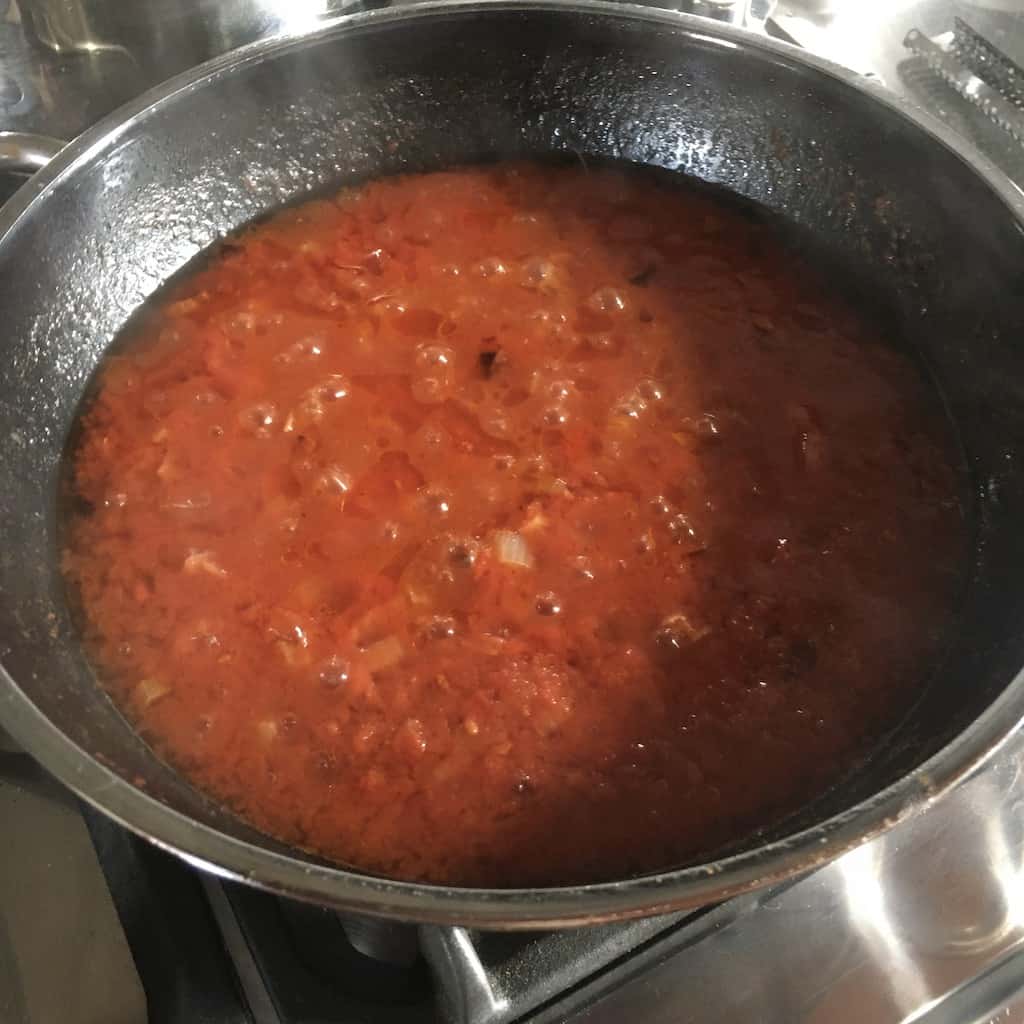 Prosciutto sugo red pasta sauce cooking