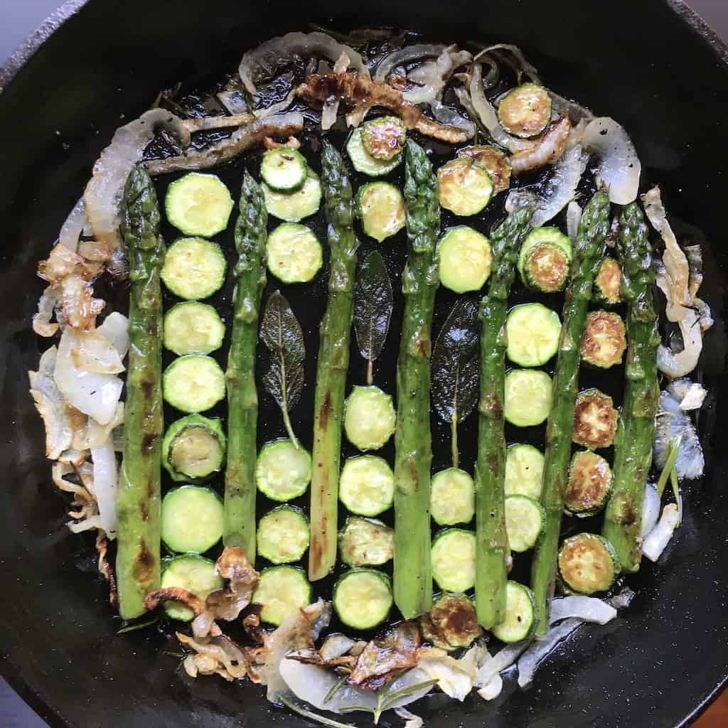 add zucchini slices where there are any gaps