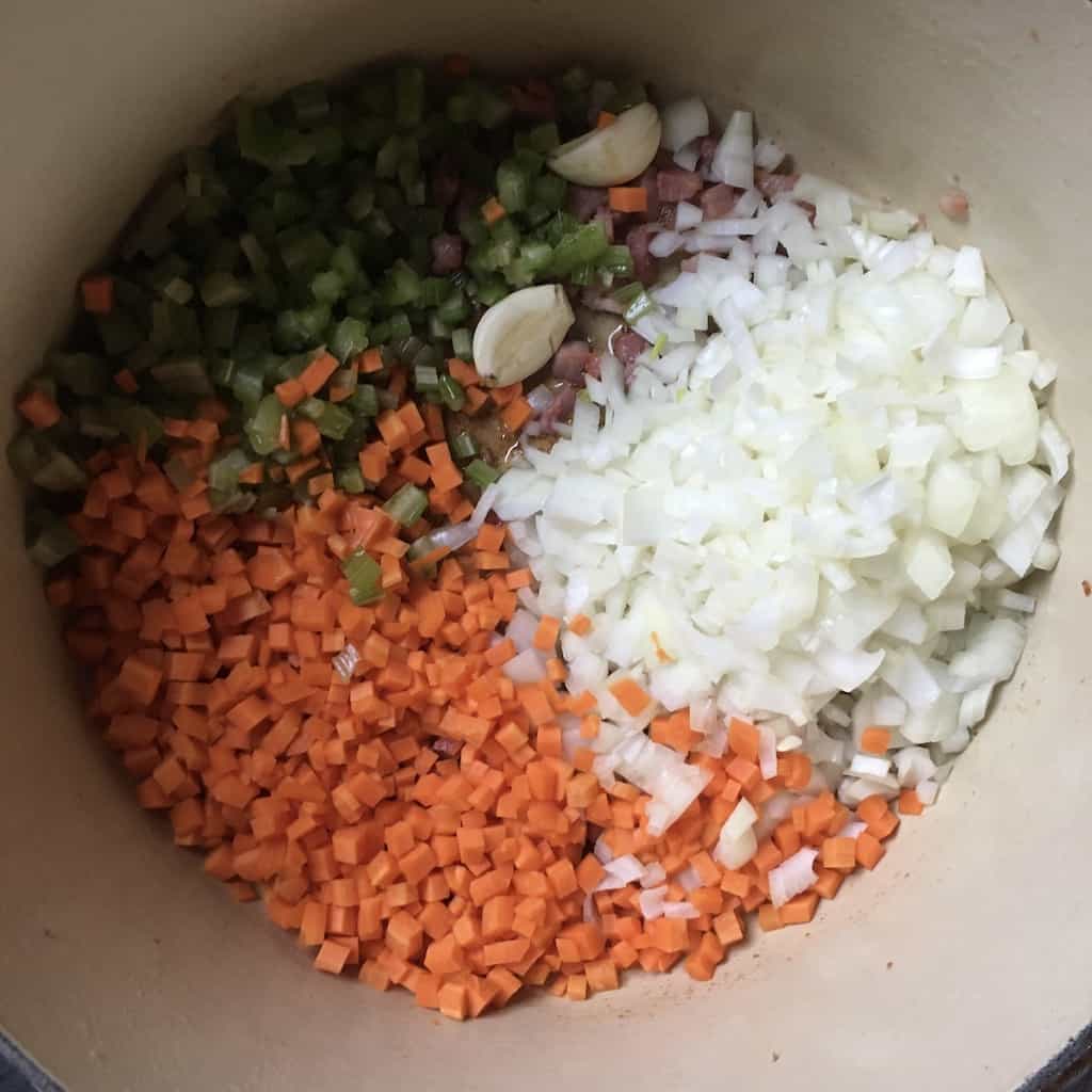 mirepoix plus smashed garlic added to the dutch oven with pancetta