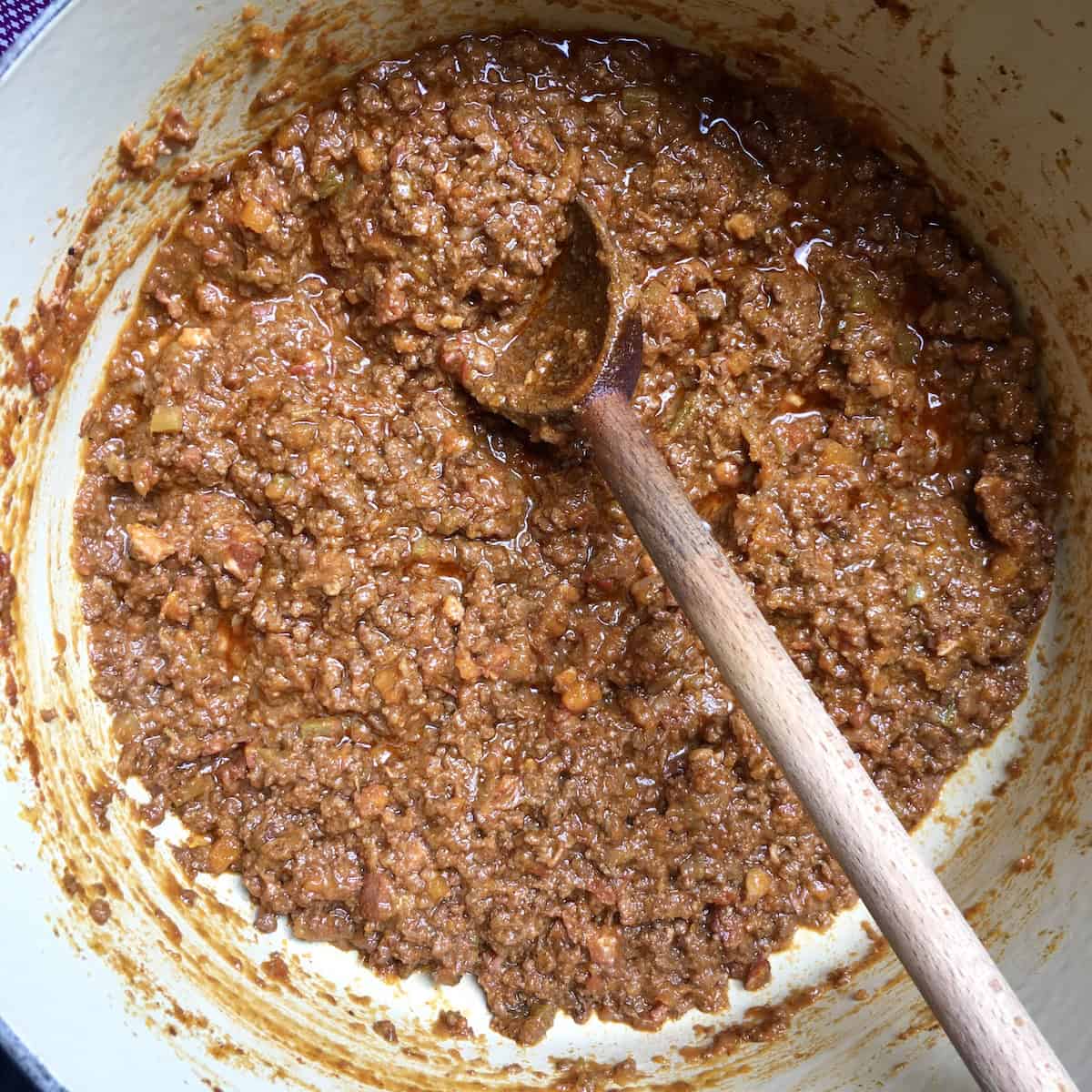 Healthy bolognese sauce in a pot after finished cooking, healthy bolognese recipe made from scratch for a lighter ragu sauce you can make at home.
