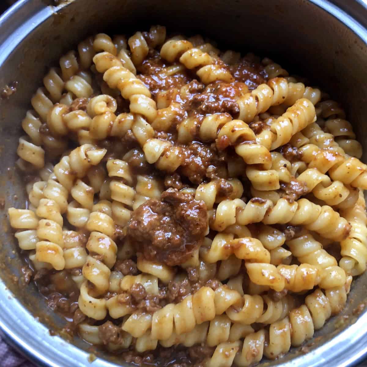Pasta bolognese fully mixed with ragu sauce and ready to eat, best spaghetti bolognese recipe made with a traditional Italian bolognese pasta sauce from scratch.