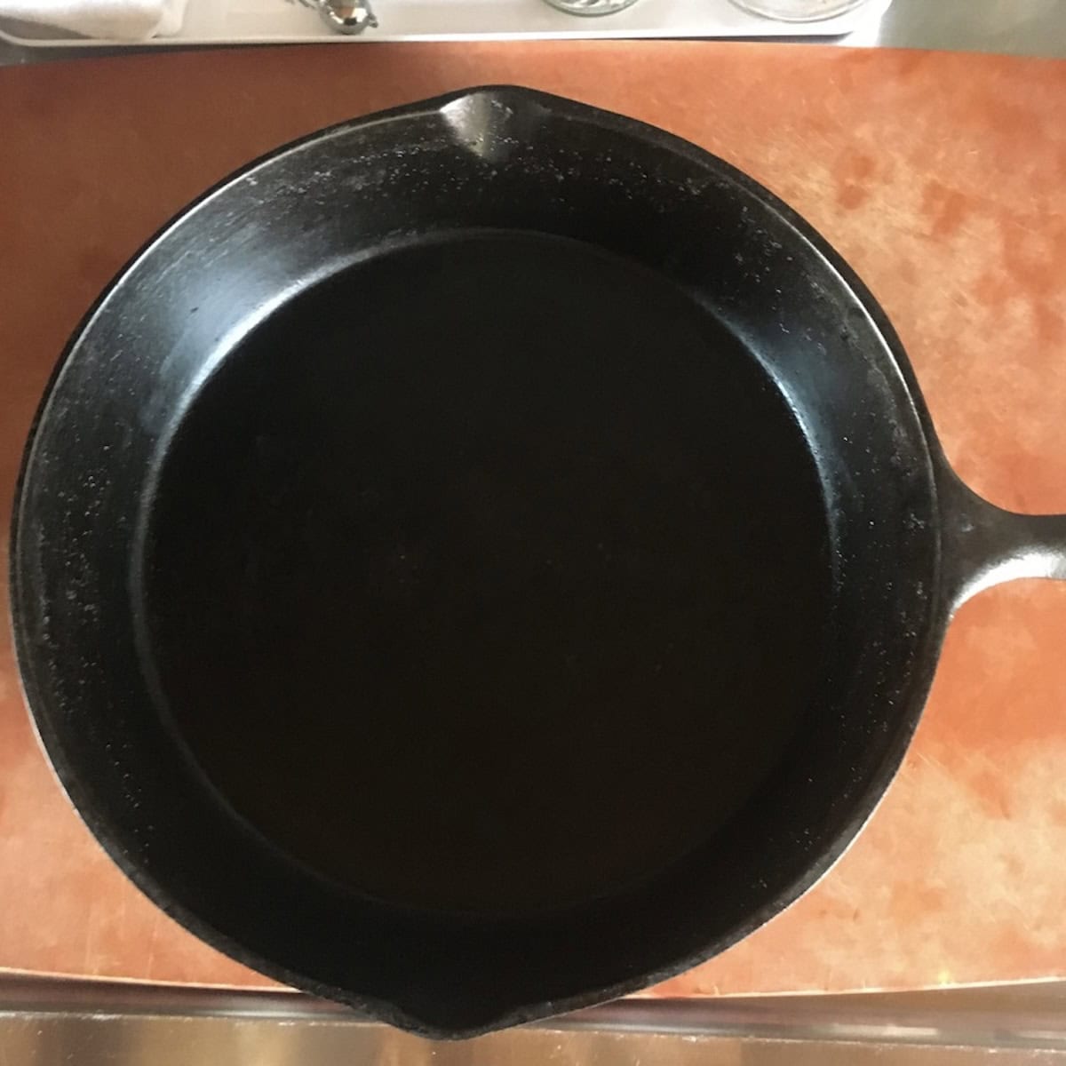 Well-seasoned 10-inch cast iron skillet as a crepe pan for perfect crepes, sweet crepe recipe and savory crepe fillings, breakfast crepes, and simple crepe batter results.