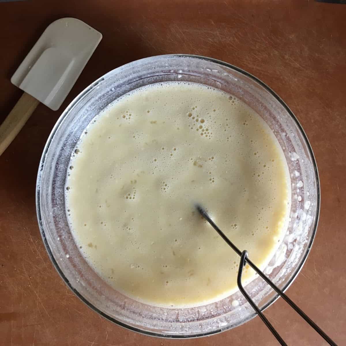 Freshly whisked crepe batter resting before cooking, showing the ideal crepe batter consistency for this simple crepe batter and crepe batter recipes.


