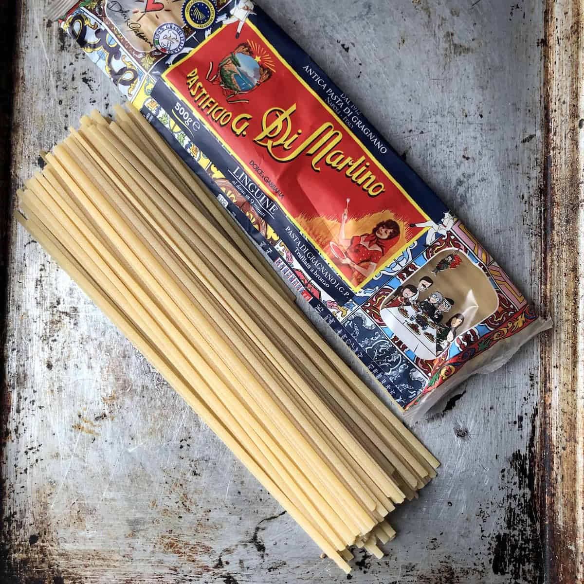 Package of Italian Pastificio G. Di San Martino bronze-drawn artisanal linguine pasta for authentic linguine alle vongole.
