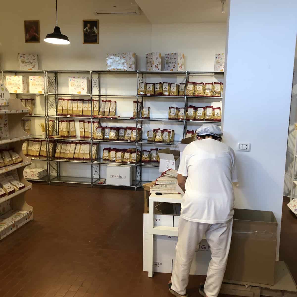 Inside Verrigni pasteficio in Abruzzo with gold drawn and bronze drawn artisan pastas, olive oil, and passata for sale, perfect pasta for linguine and clams.
