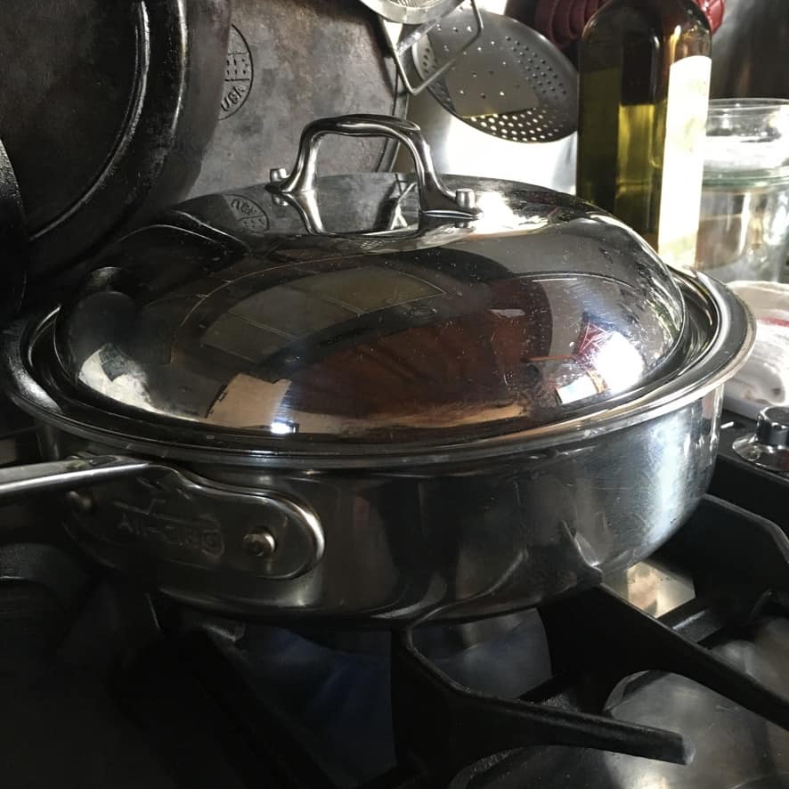 a lid on top of the mussels to allow them to steam