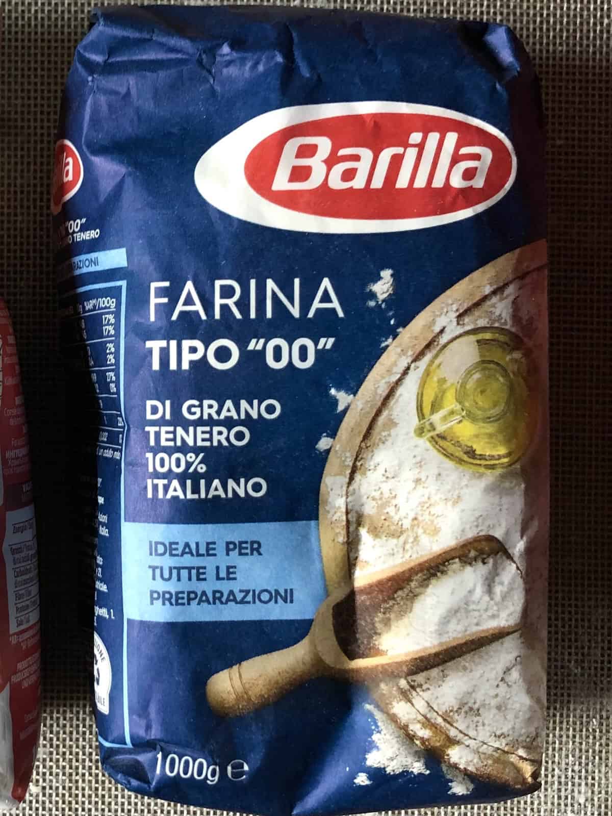 A bag of Italian Barilla 00 flour (farina tipo 00) with 11% protein (a soft wheat finely milled Italian flour).