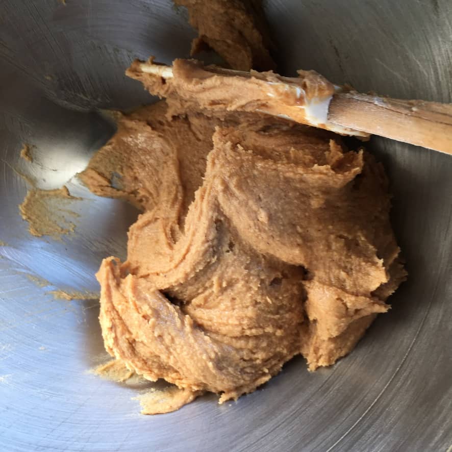 peanut butter vanilla bean candy mixture with Le Creuset spatula