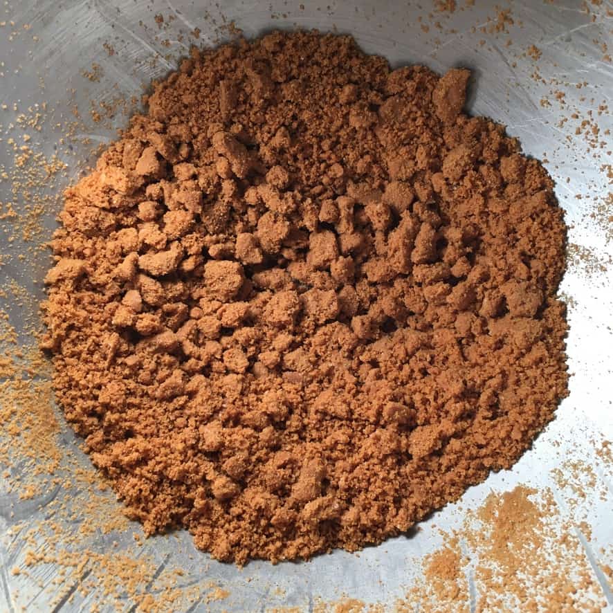 crumbled Biscoff cookies in a stainless steel bowl
