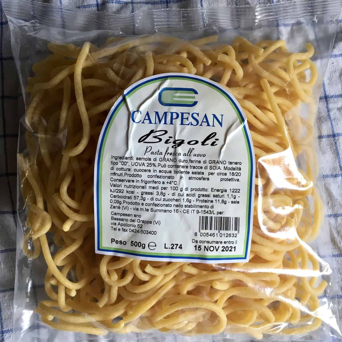 Bigoli pasta package from Italian grocery store front label including bigoli nutrition information and cooking times for , store-bought bigoli.