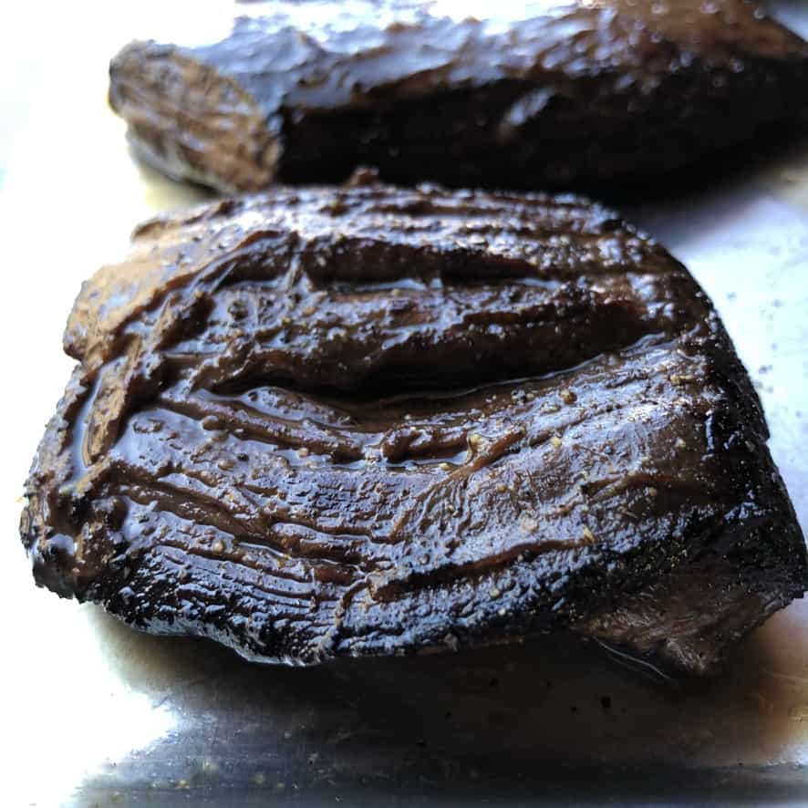 pan seared flank steak on a sheet pan resting