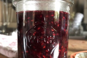 small Weck Jar with beautifully dark berry sauce in it