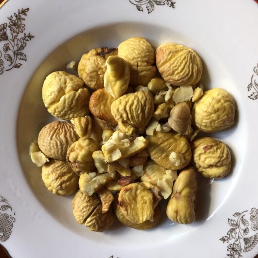 a bowl of peeled roasted chestnuts