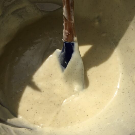 a le creuset spatula in the final cheesecake base