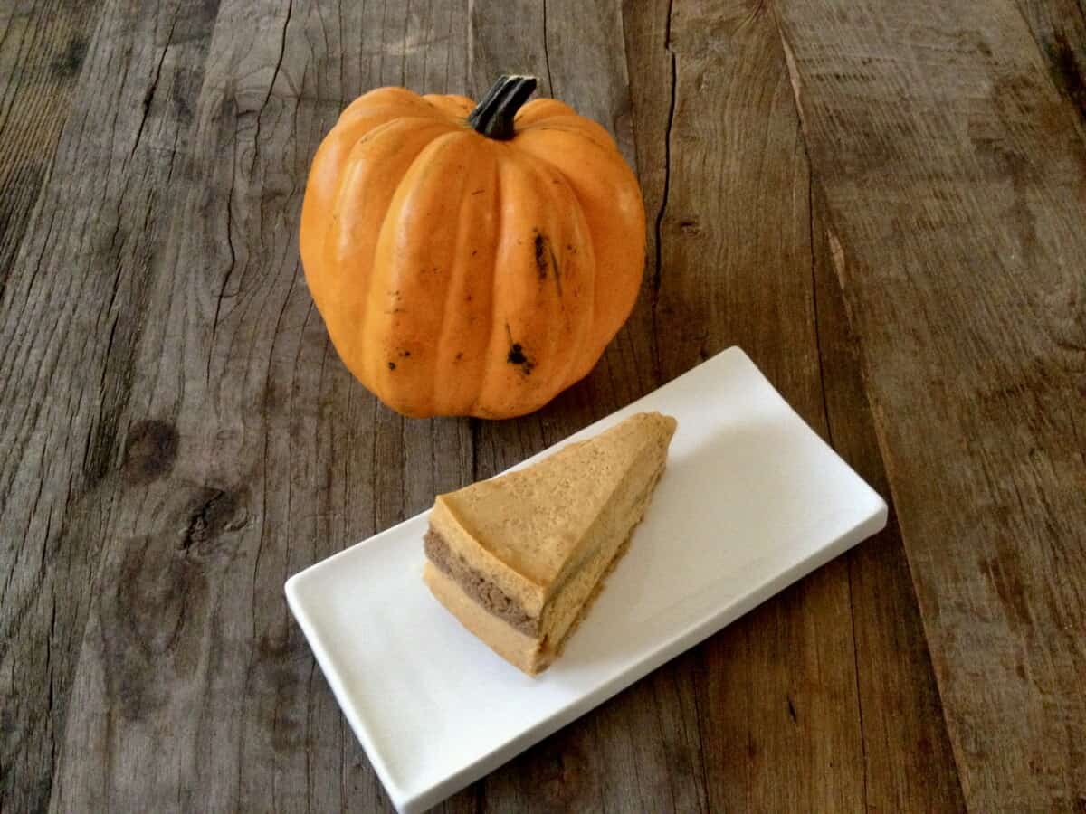 A slice of Pumpkin Cheesecake with double Chestnut Graham Cracker Crust