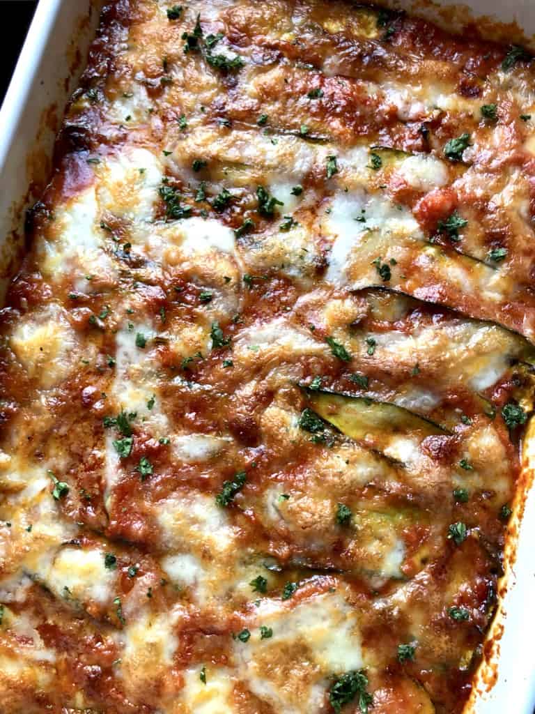 eggplant and zucchini parmigiana just baked (closeup)