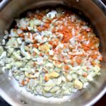 onions, carrots and garlic added to saute pan