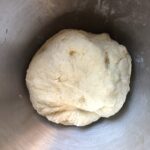 a soft but not smooth wonton wrapper dough after 2 minutes of kneading
