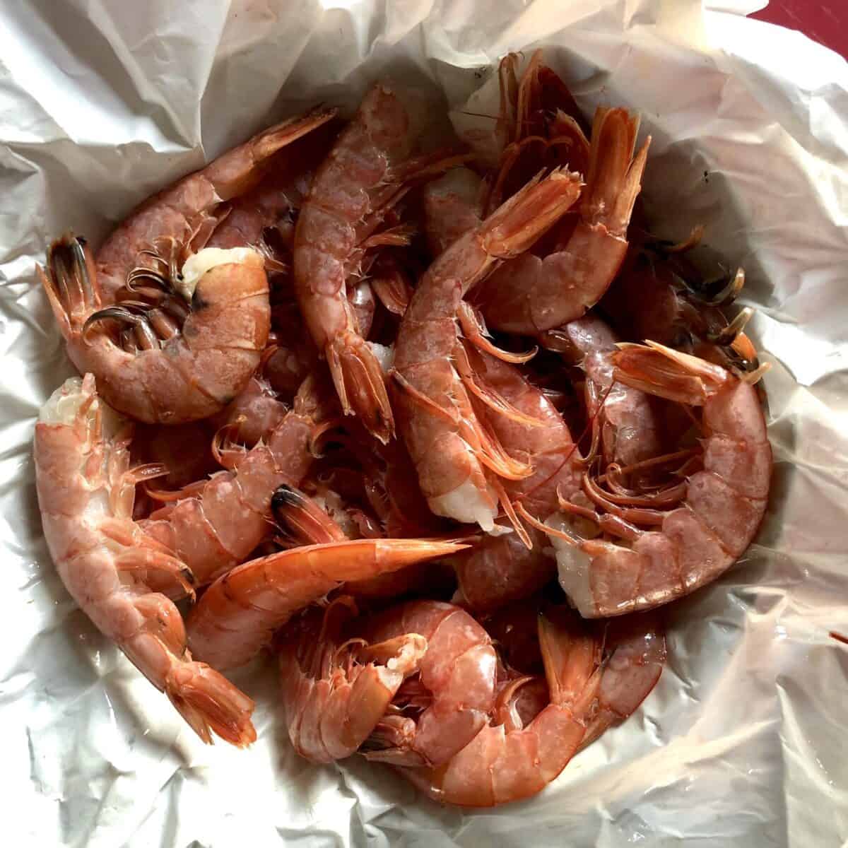 a bowl full of large red Argentinian shrimp