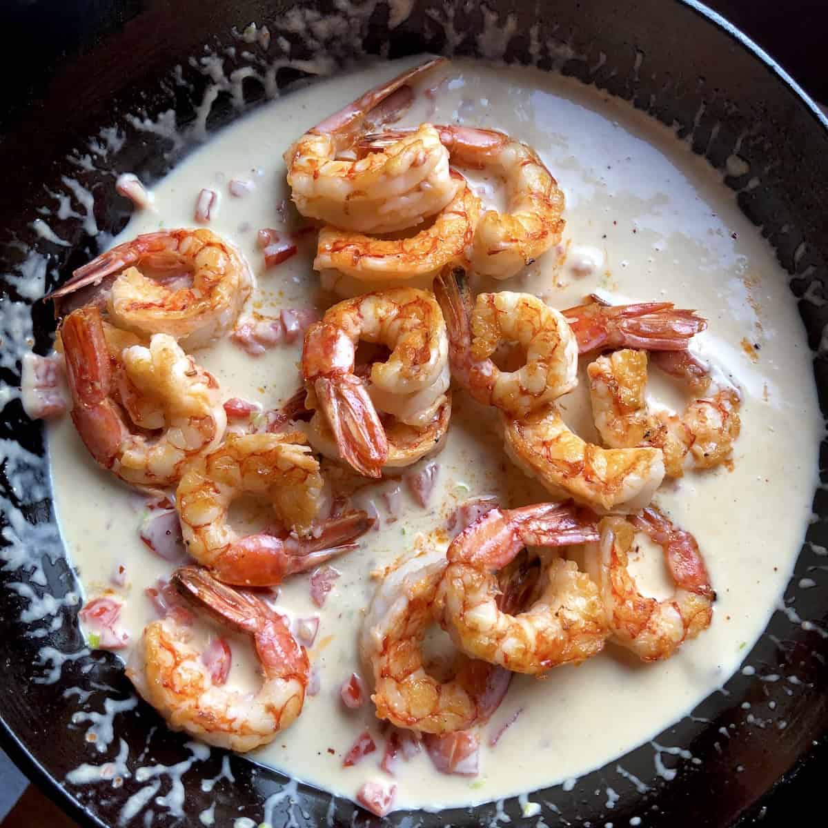 Argentinian red shrimp in creamy alfredo sauce ready for fettuccine pasta, shrimp alfredo recipe.