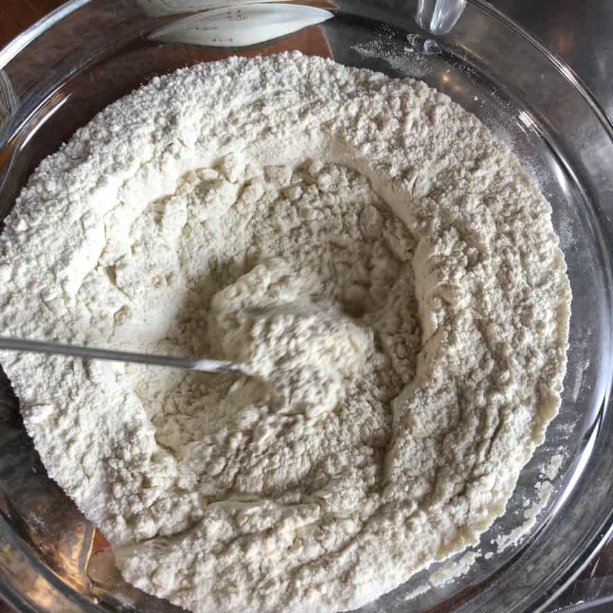 flower, salt, and baking soda whisked in a bowl