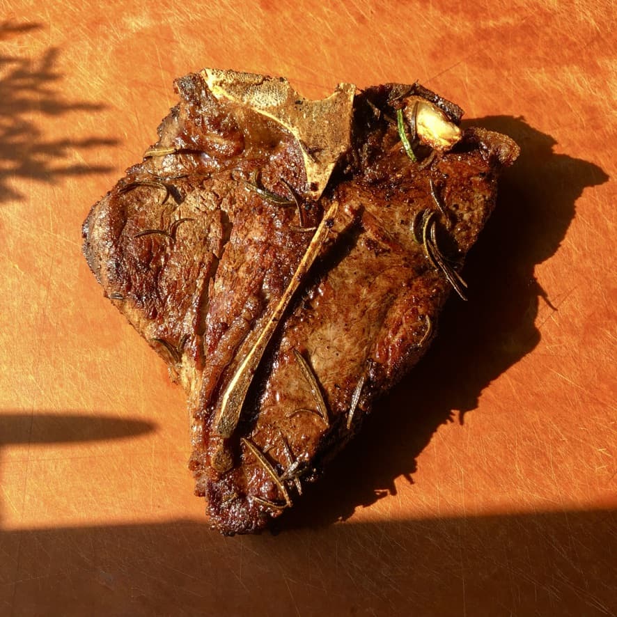 a beautiful golden brown Florentine beef steak cooked perfectly