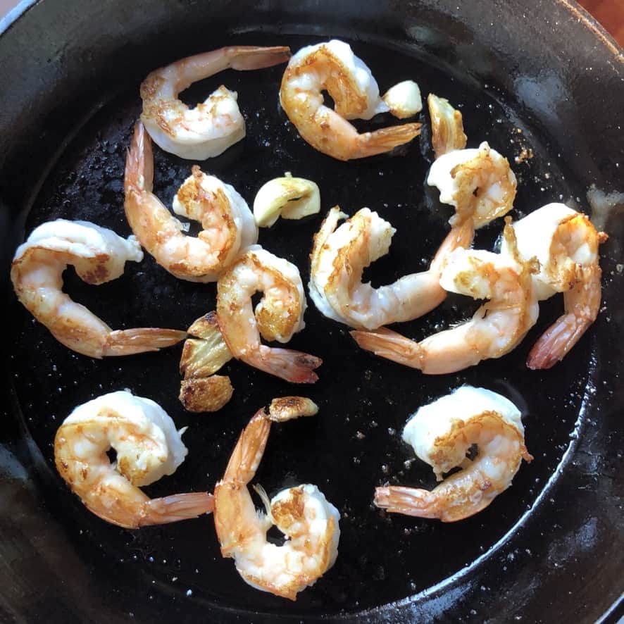 Perfectly sauteed shrimp i na cast iron skillet. 
