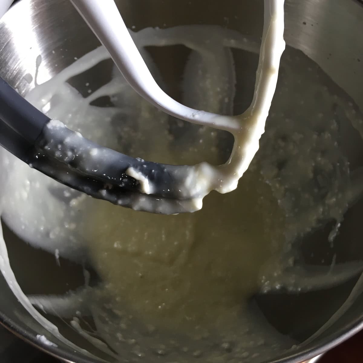 Butter and oil creamed together for a moist carrot cake recipe, before adding sugar and applesauce. 